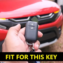 Load image into Gallery viewer, Premium Metal Silicon Key Cover Compatible with Maruti Suzuki jimny Baleno Grand Vitara XL6 Swift New Brezza 2022 Ertiga Dzire 2 Button Key Special Feature Visibilitye in Low-Ligh Condition