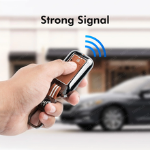 Load image into Gallery viewer, Premium Metal Silicon Key Cover Compatible with Maruti Suzuki jimny Baleno Grand Vitara XL6 Swift New Brezza 2022 Ertiga Dzire 2 Button Key Special Feature Visibilitye in Low-Ligh Condition