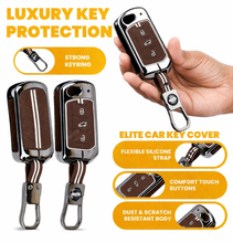 Load image into Gallery viewer, Premium Black Chrome Metal Silicone Key Cover – Glow-in-The-Dark, Waterproof, Key Fob Protector for Mahindra Scorpio Marazzo Xuv 300 Xuv 700 Xuv 400 Ev Bolero Thar Tuv 3 Button Flip Key