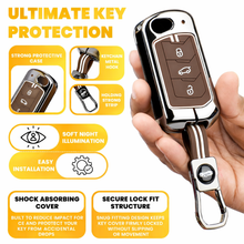 Load image into Gallery viewer, Premium Black Chrome Metal Silicone Key Cover – Glow-in-The-Dark, Waterproof, Key Fob Protector for Mahindra Scorpio Marazzo Xuv 300 Xuv 700 Xuv 400 Ev Bolero Thar Tuv 3 Button Flip Key